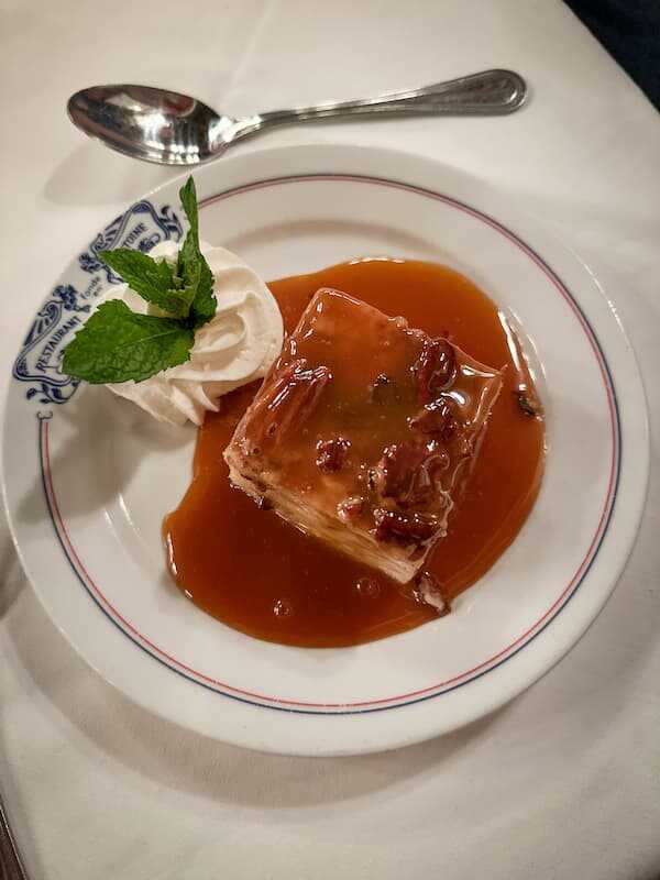 Pecan Bread Pudding - traditional food at Antoine's
- best places to eat dinner in New Orleans French Quarter